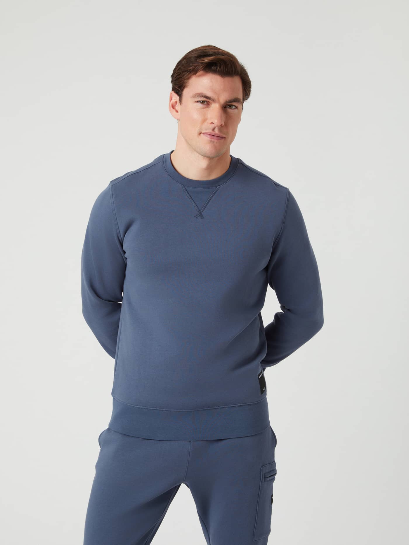 Front view of a man wearing the soft cotton-blend Björn Borg Centre Crew in Nightshadow Blue (Blue) in a regular fit. - Image 1