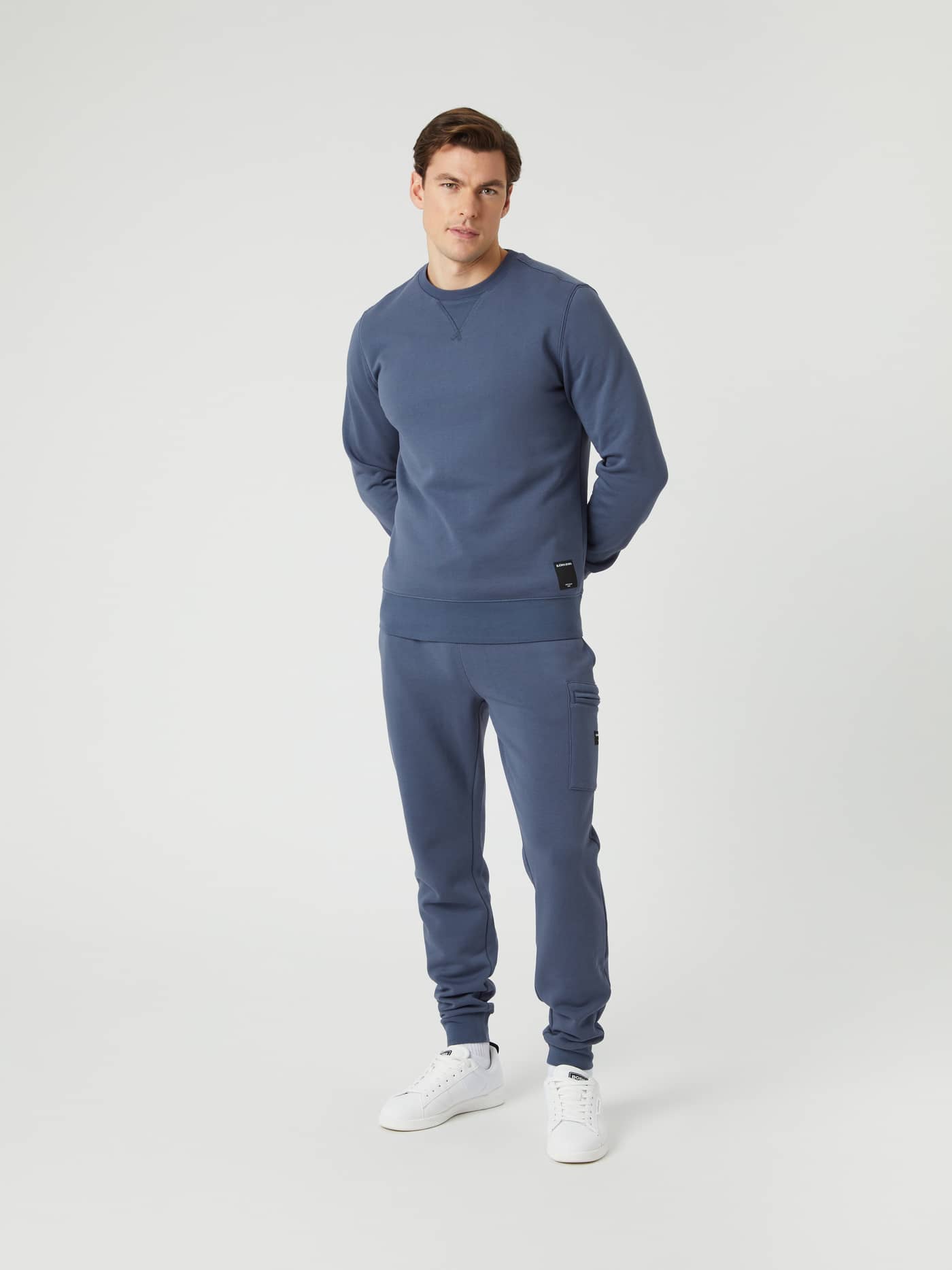 Full-body front view of a man wearing the Björn Borg Centre Crew in Nightshadow Blue (Blue) for a classic everyday look. - Image 3