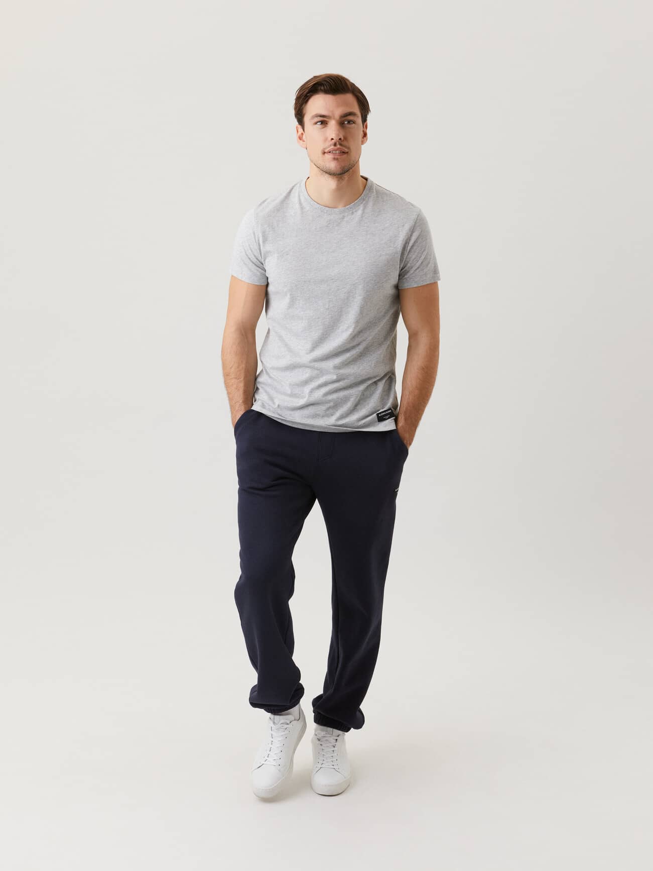 Full-body front view of a man wearing the cotton Björn Borg Centre Tee in Light Grey Melange (Grey). - Image 4