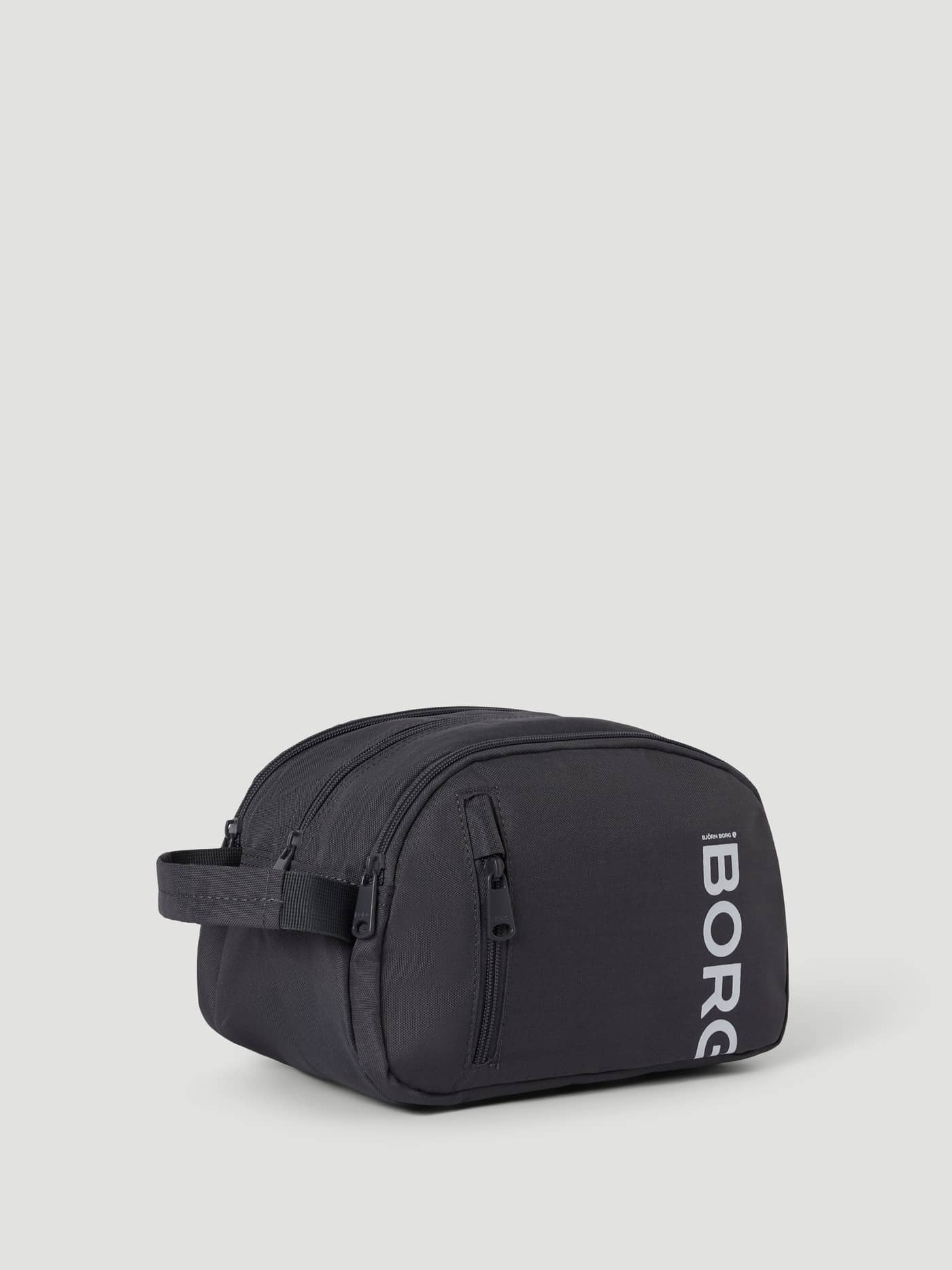 Trousse de toilette Core Wash Bag Standing en Asphalt (Gris) avec logo BORG blanc, poignée latérale et poche zippée. - Image 2