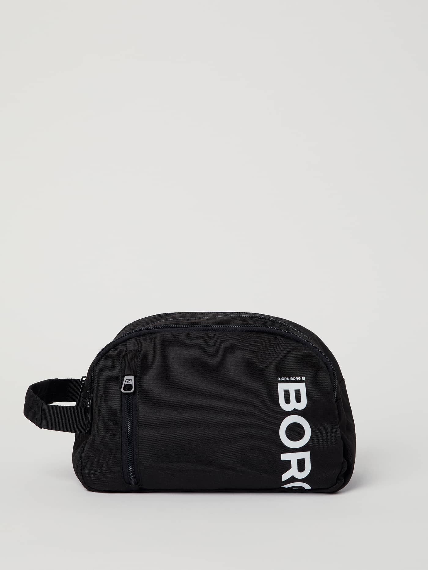Front view of the black Core Toilet Case Standing in durable recycled polyester with a vertical white BORG logo. - Image 1