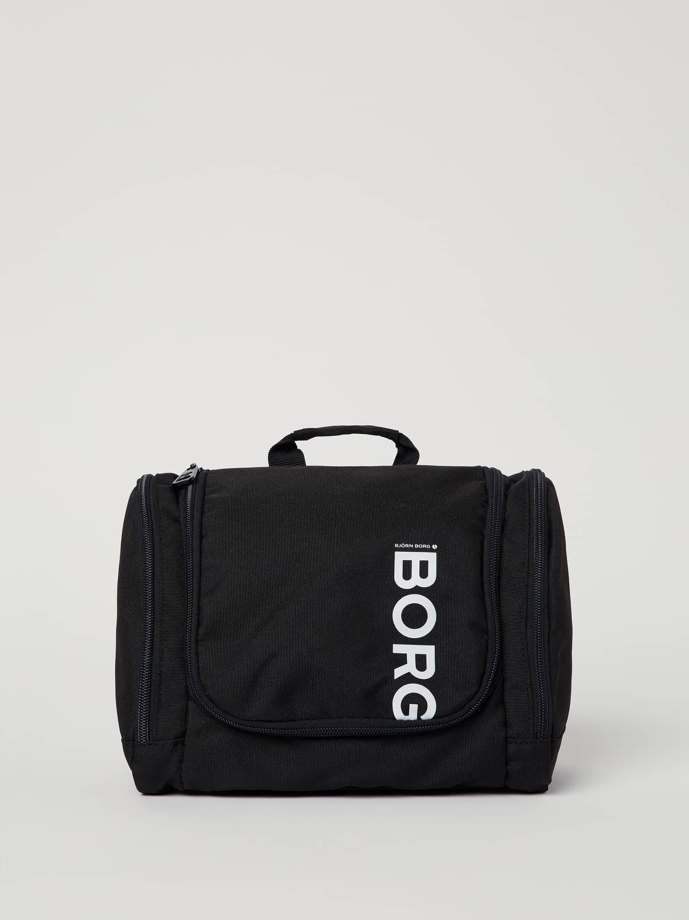 Björn Borg Core Toilet Case Hanging in Black Beauty (Zwart) met een wit verticaal BORG-logo, vooraanzicht. - Image 1