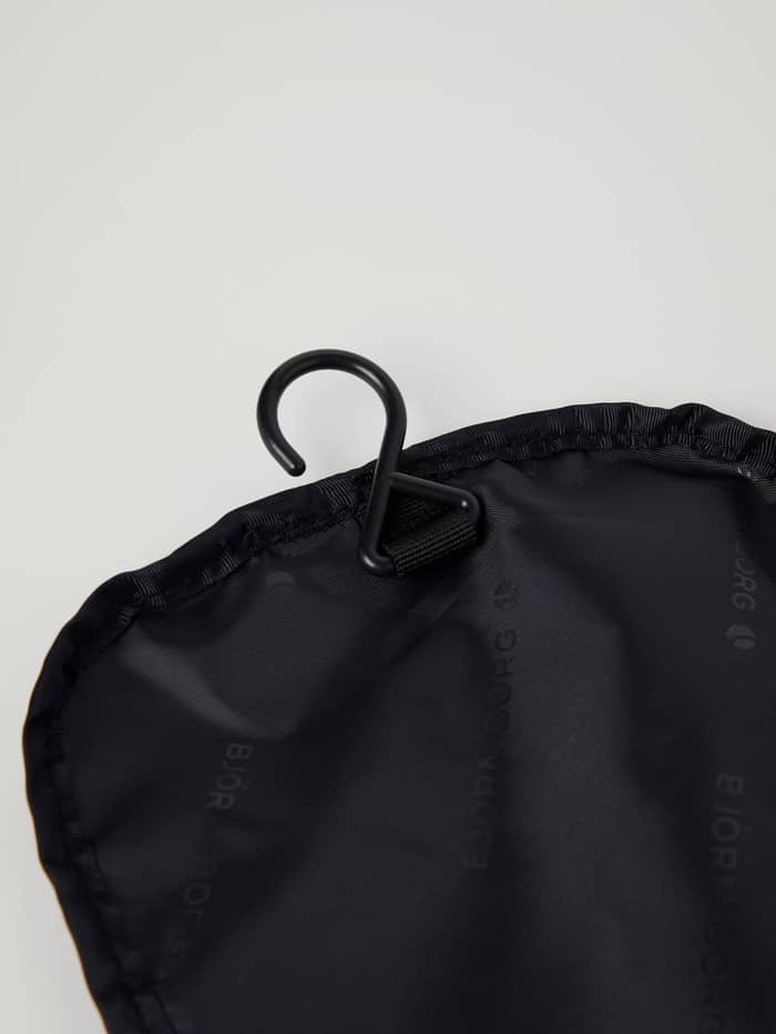 Geïntegreerde kunststof ophanghaak op de zwarte Core Toilet Case Hanging met ton-sur-ton merklogo's. - Image 5
